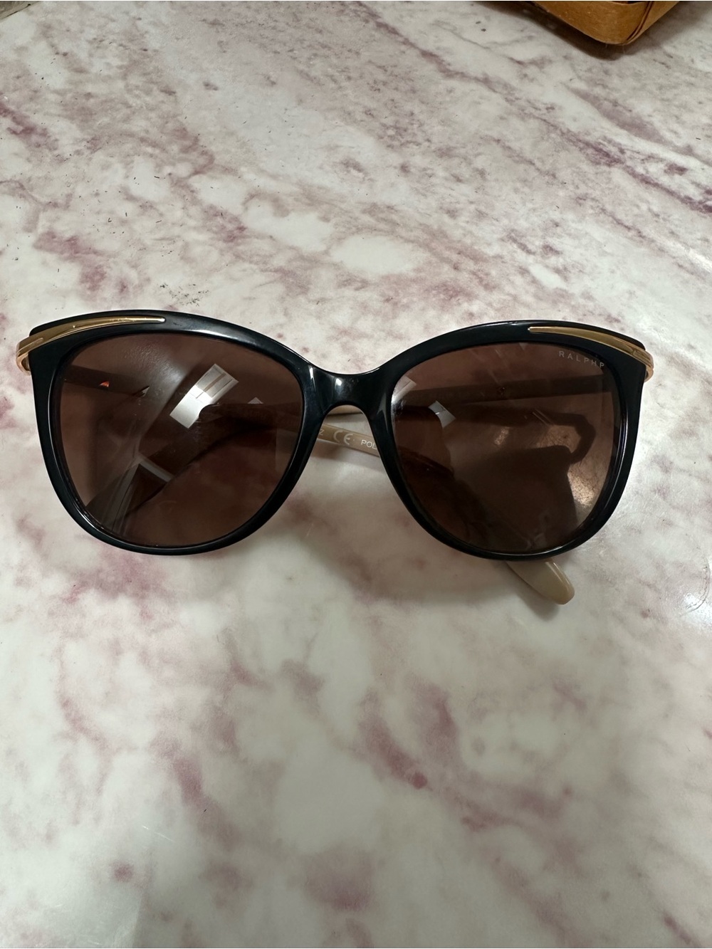 Ralph Lauren Women's Black Sunglasses with Gold Trim and Brown Lenses